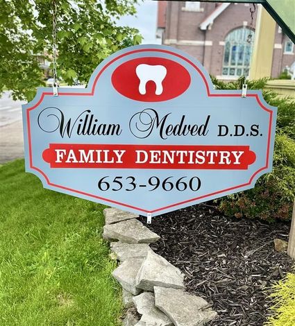 Dentist Showing Jaw Model — Lancaster, OH — William L. Medved