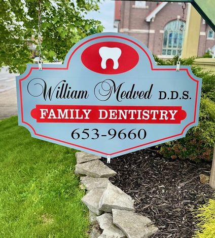 Dentist Showing Jaw Model — Lancaster, OH — William L. Medved