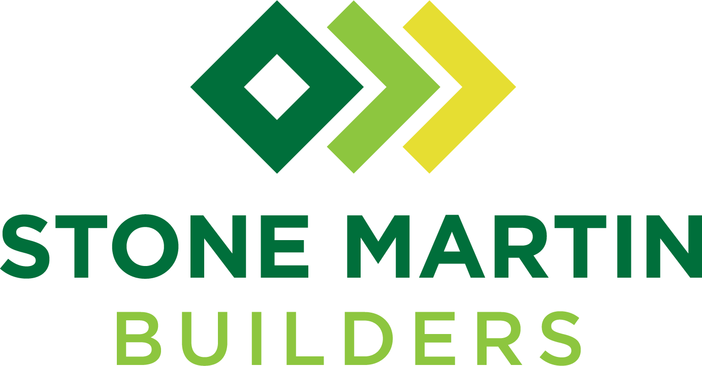 The logo for stone martin builders is green and yellow with arrows pointing in opposite directions.