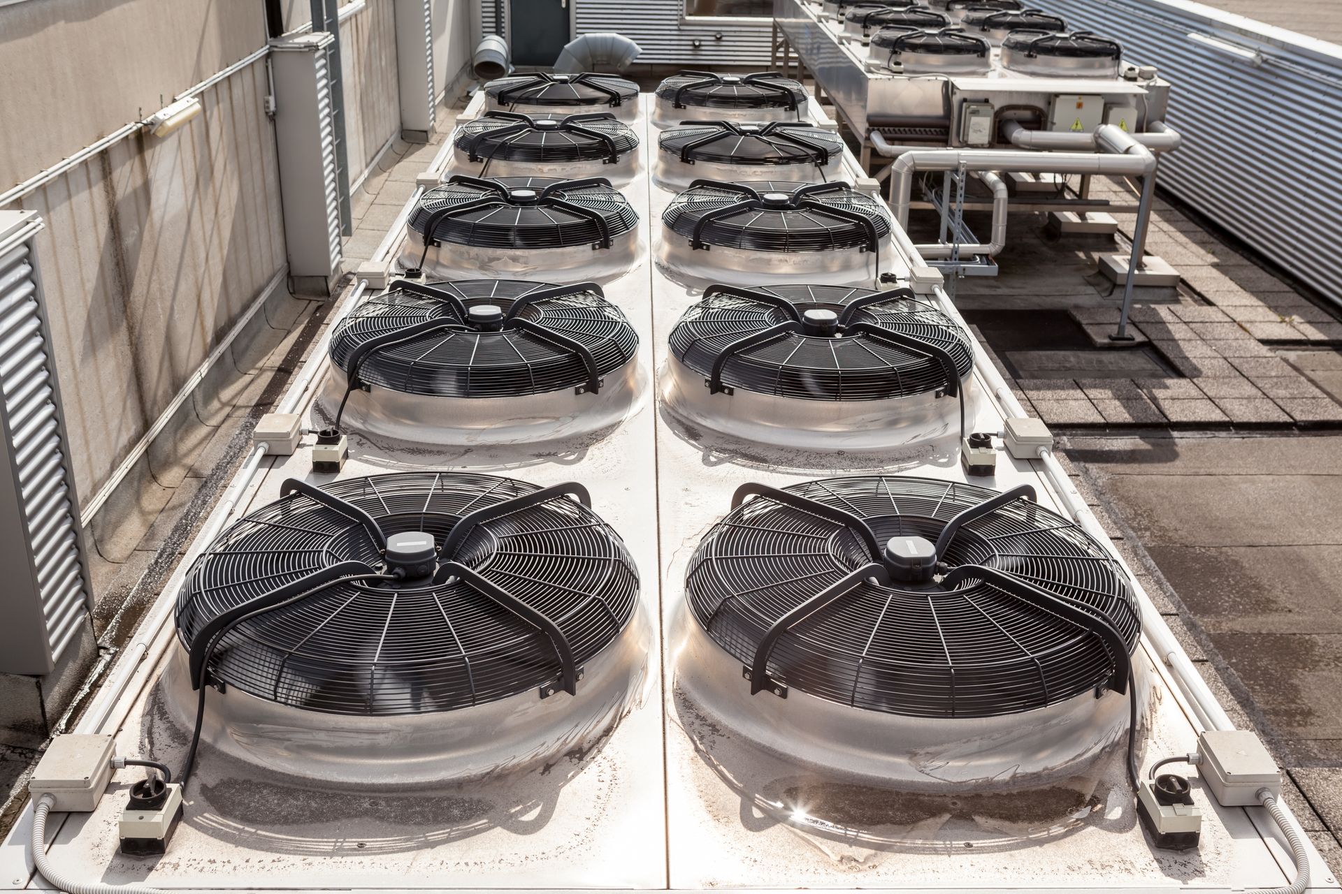 Fans on the roof of a building.