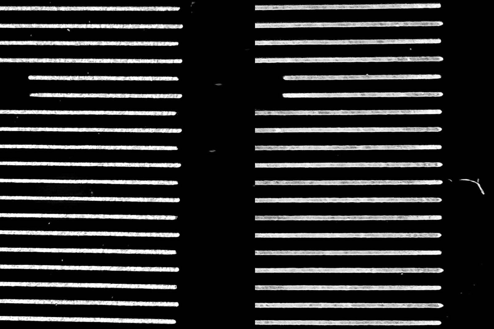 Black-and-white scan test comparison showing misaligned lines on the left and corrected line spacing on the right.
