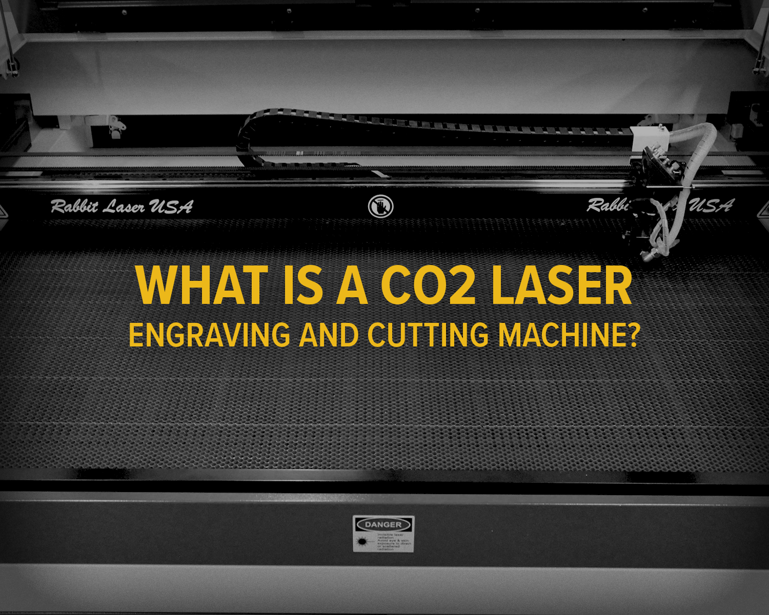 Title text over honey comb and gantry of co2 laser machine