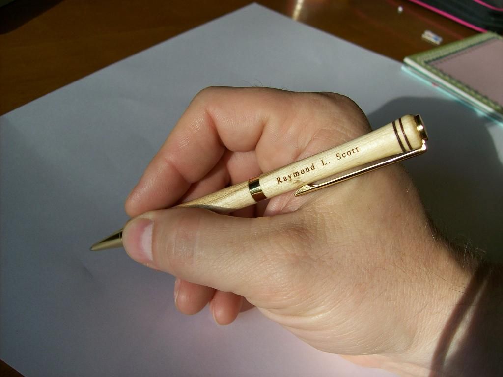 man holding a pen