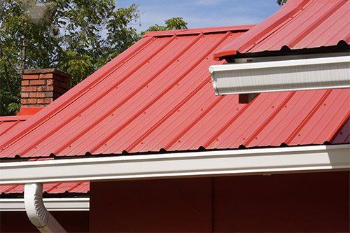 House With Red Metal Roof