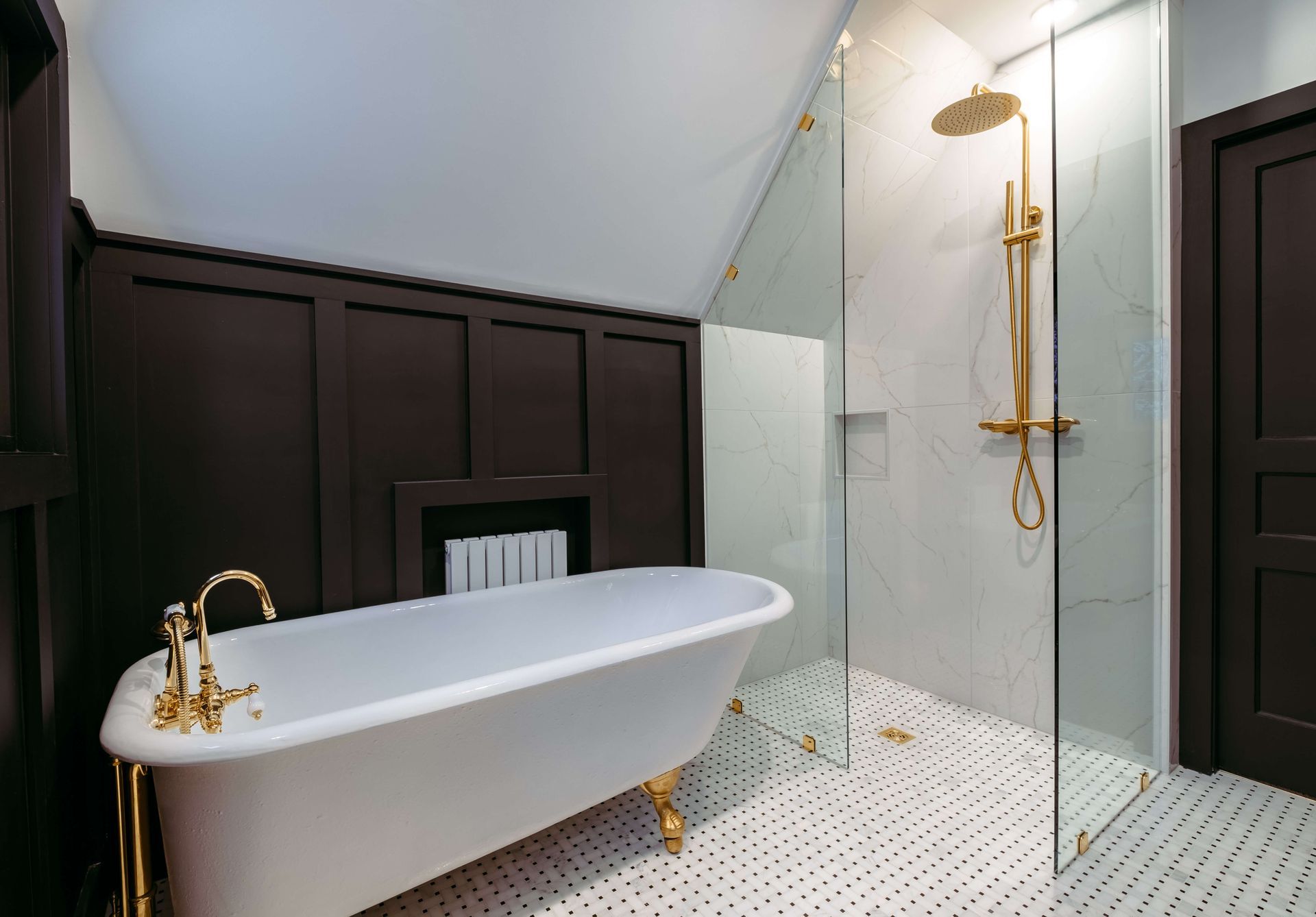 plumbing project of residential bathroom tiled flooring with freestanding bathtub