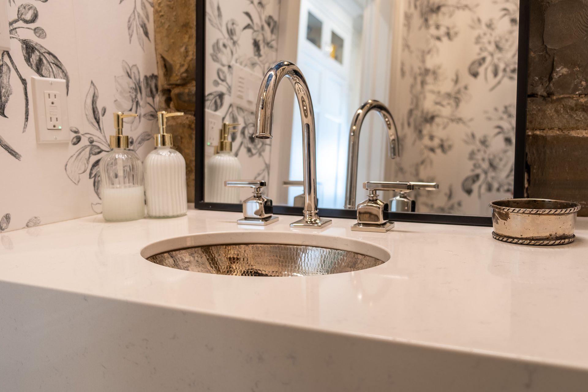 A bathroom sink with a faucet.