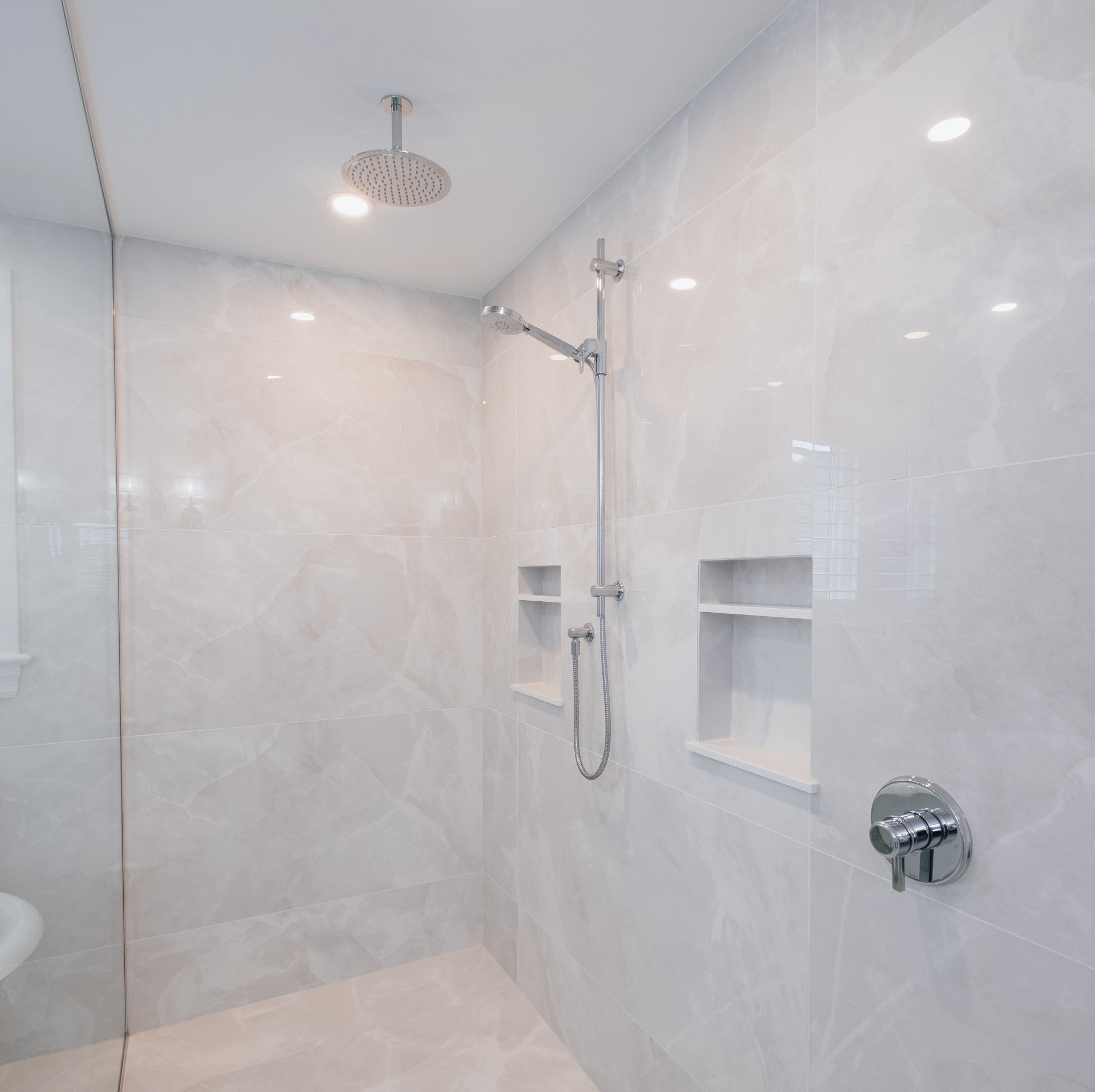 completed plumbing project residential bathroom tiled shower