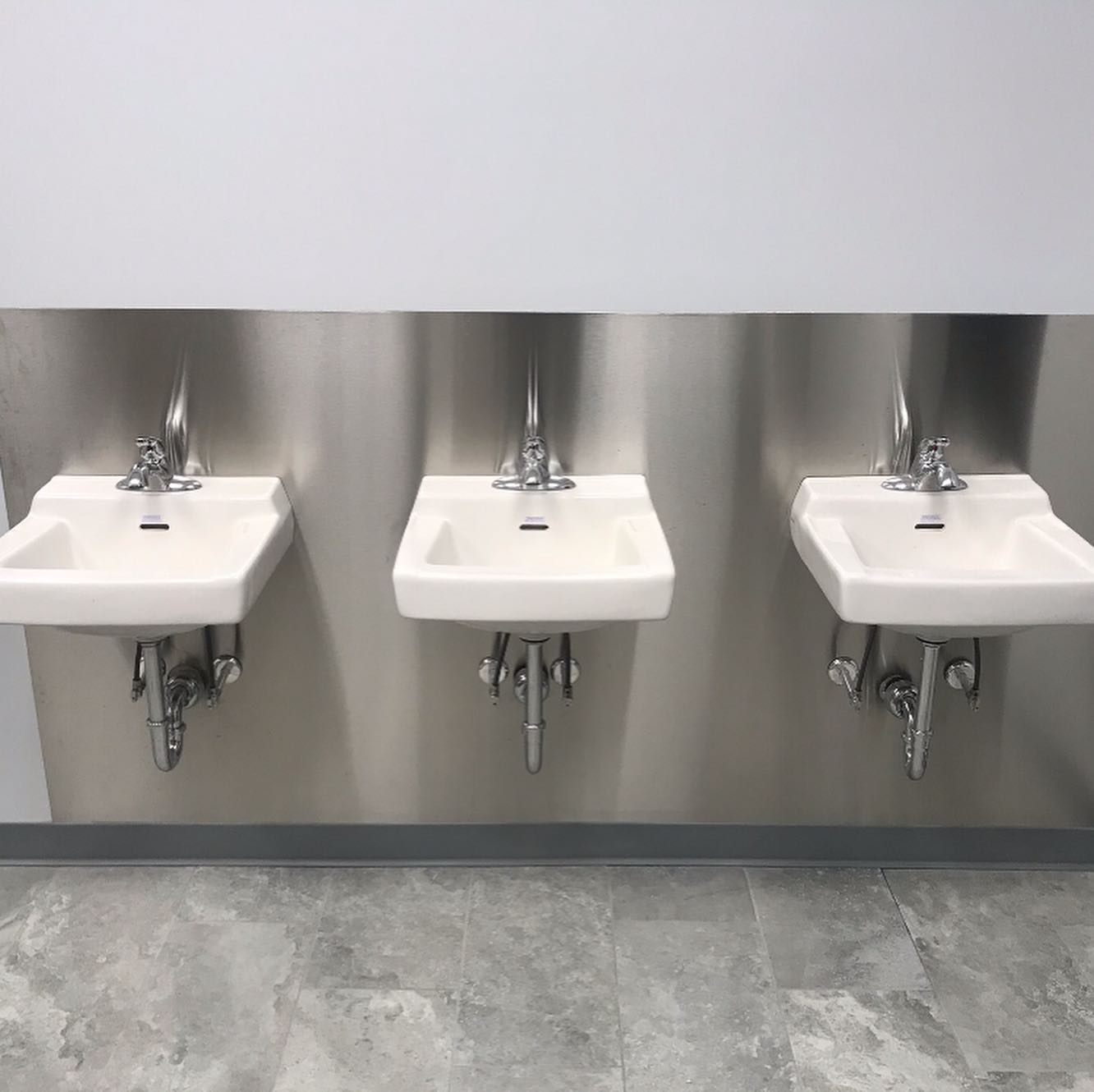 image of completed work commercial sinks by plumber in Kingston