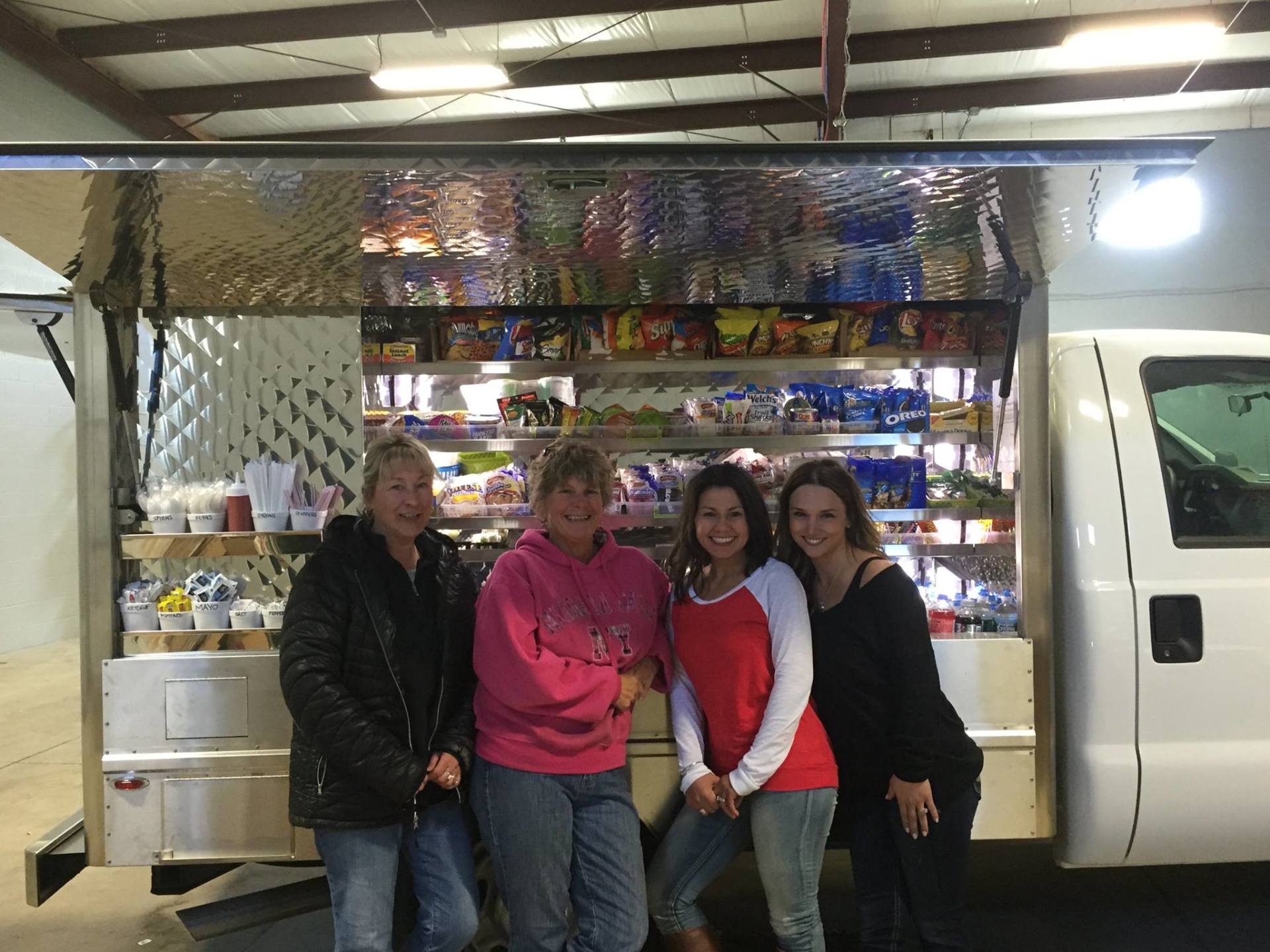 Fresh Lunch — Group Of People Smiling In Front Of Food Truck in Buffalo, NY