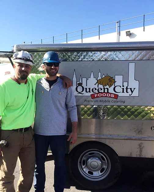Business Food Trucks —  Two Man Taking Picture In Front Of Food Truck in Buffalo, NY