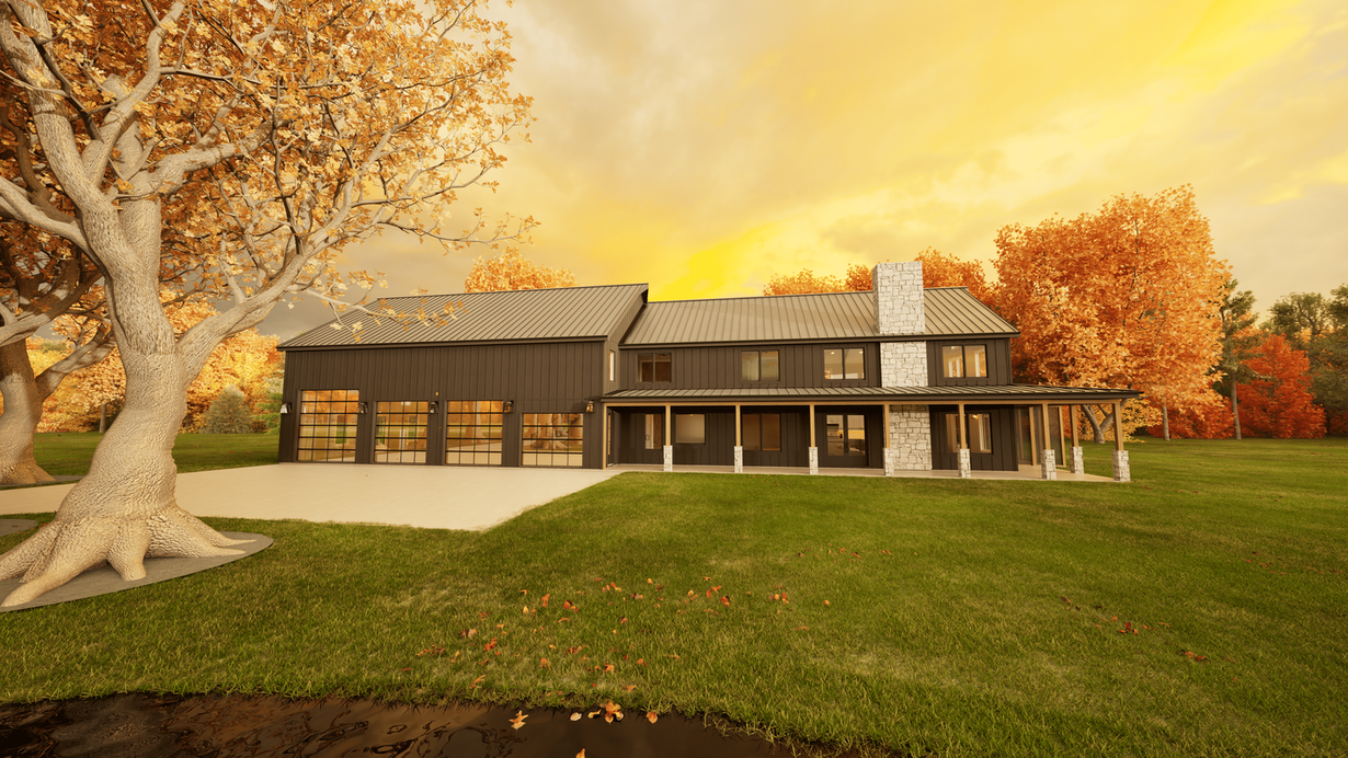 A large barndominium house is sitting on top of a lush green field surrounded by trees.