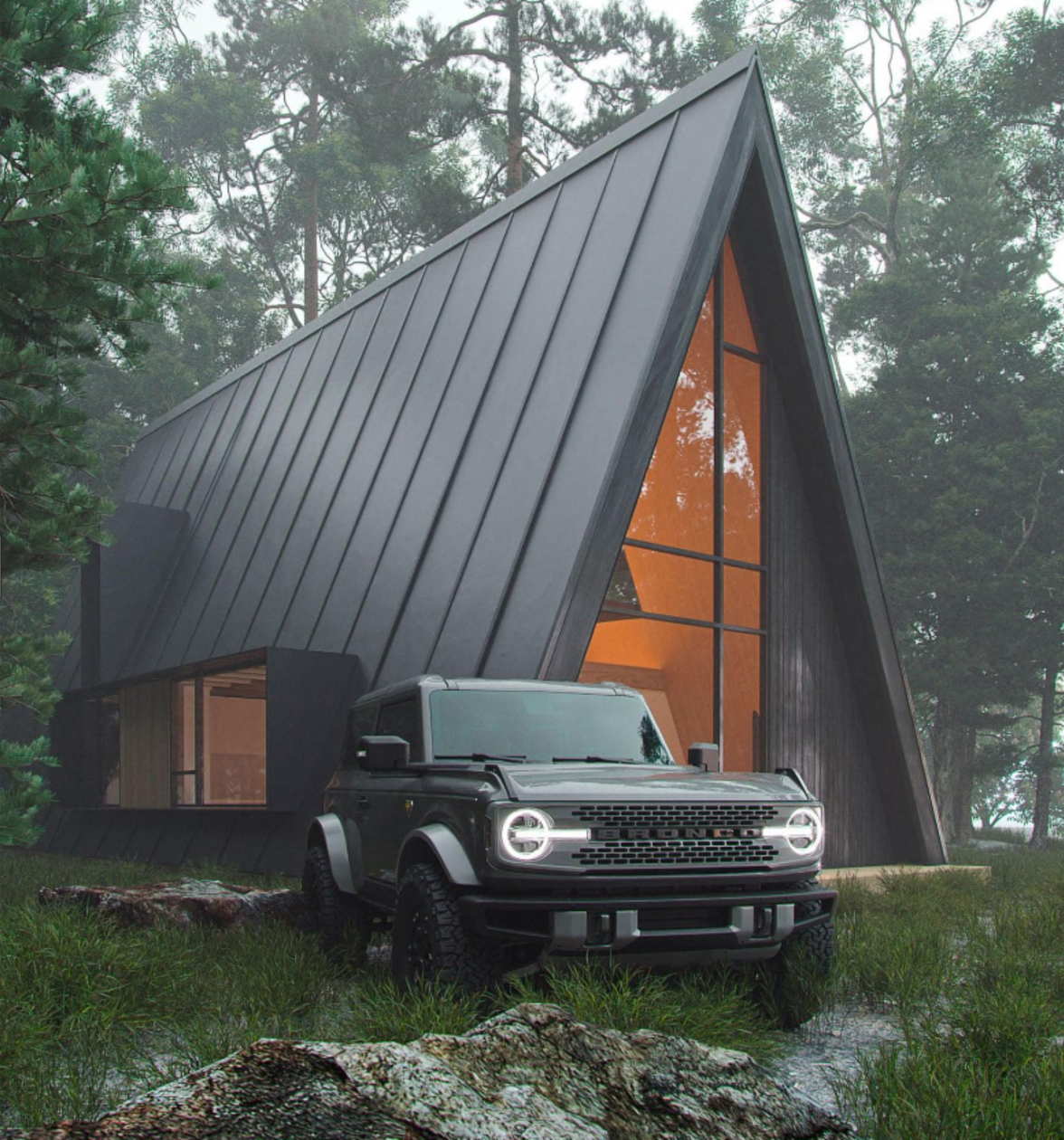 Small metal A-Frame hunting building in the woods with cabin-vibes
