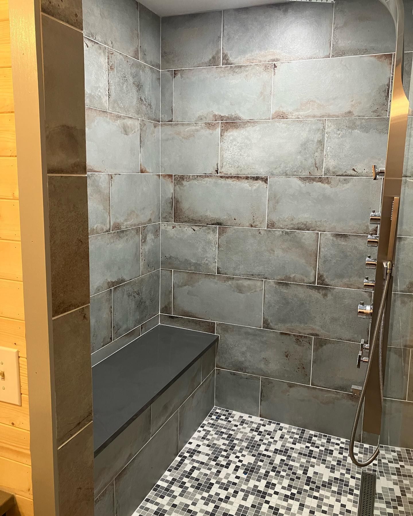 rustic tile job for a newly installed shower
