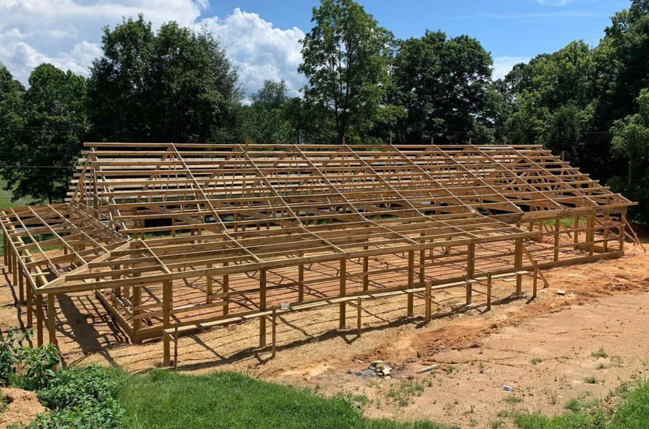 Classic Barndominium Layout being framed while under construction