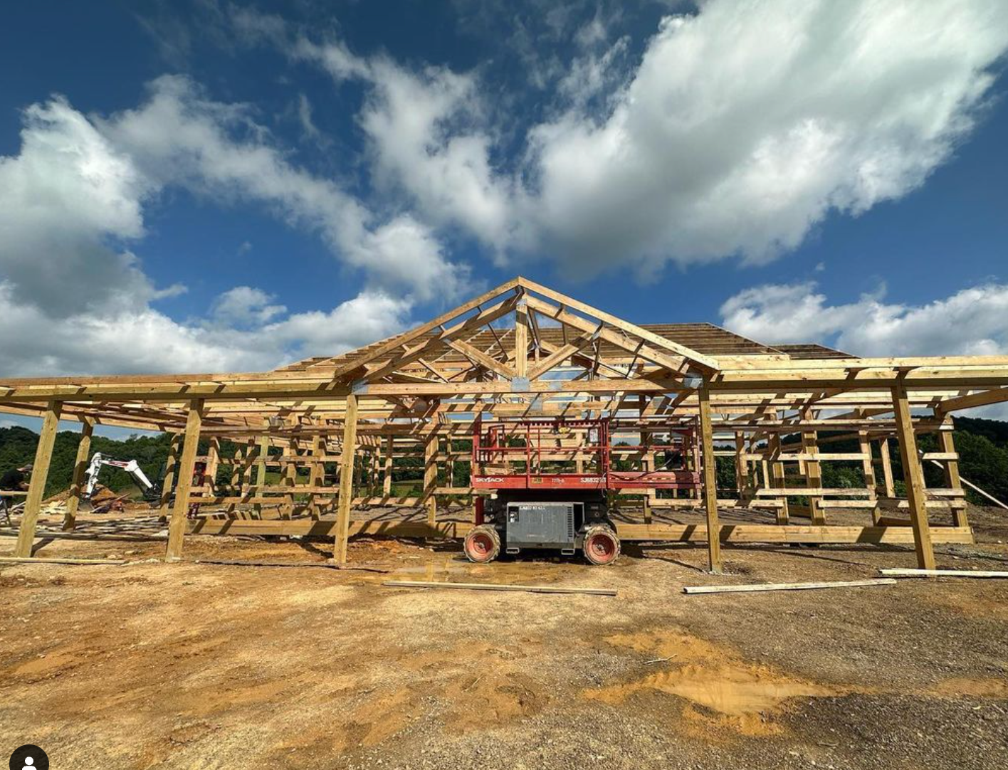 Large open barndominium layout under construction showing wooden framing