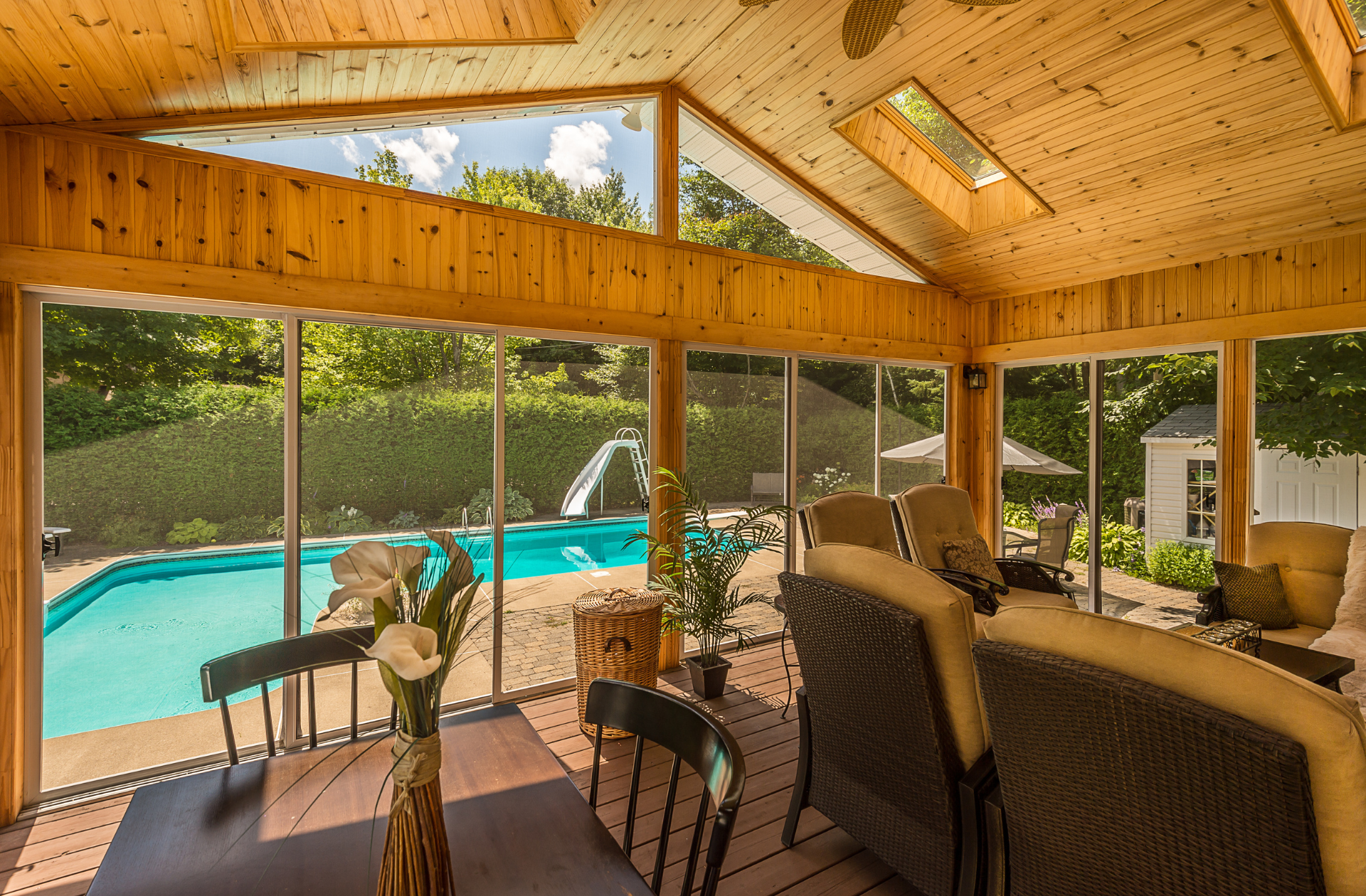 Beautiful Wooden Screened-In Porch beside a pool