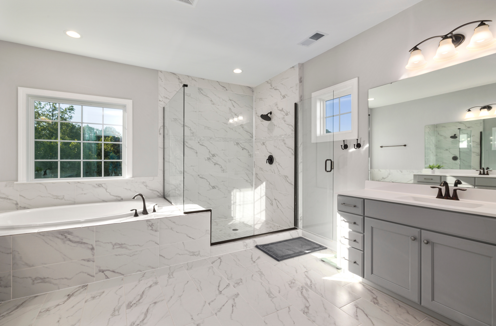 Marble Luxury Bathroom remodeled by Compass Construction