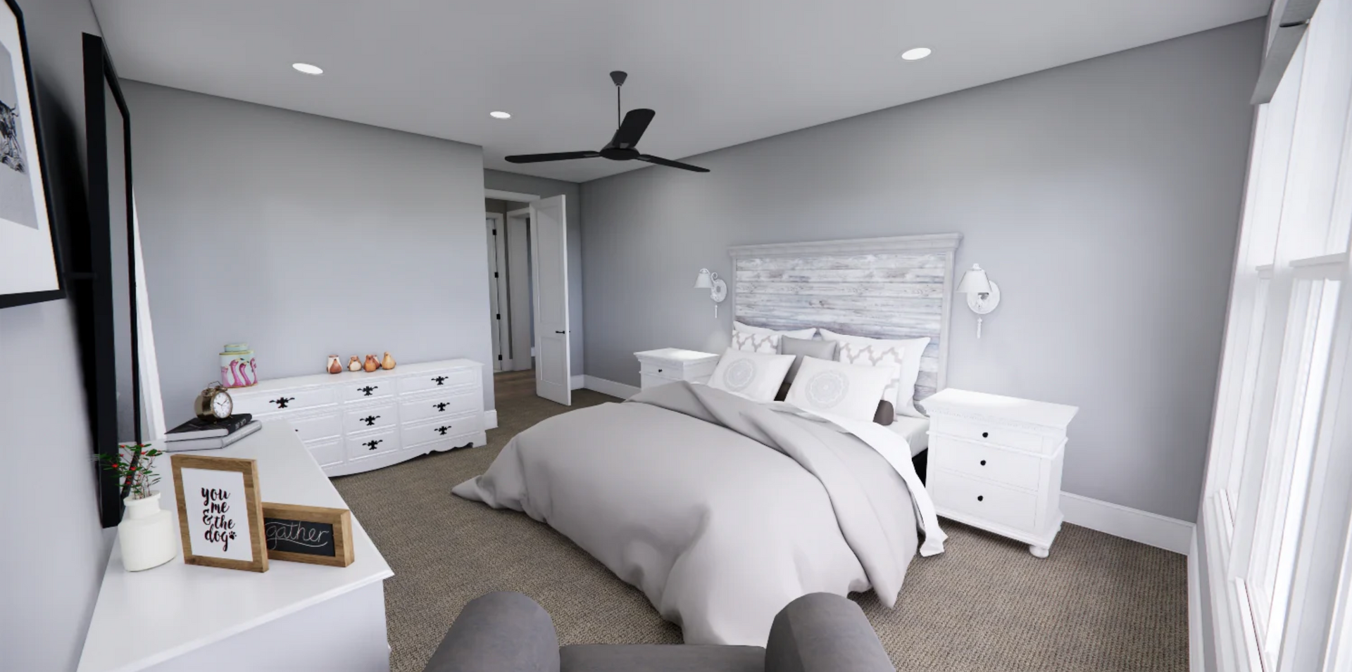 A bedroom with a bed , dresser , nightstand , chair and ceiling fan.