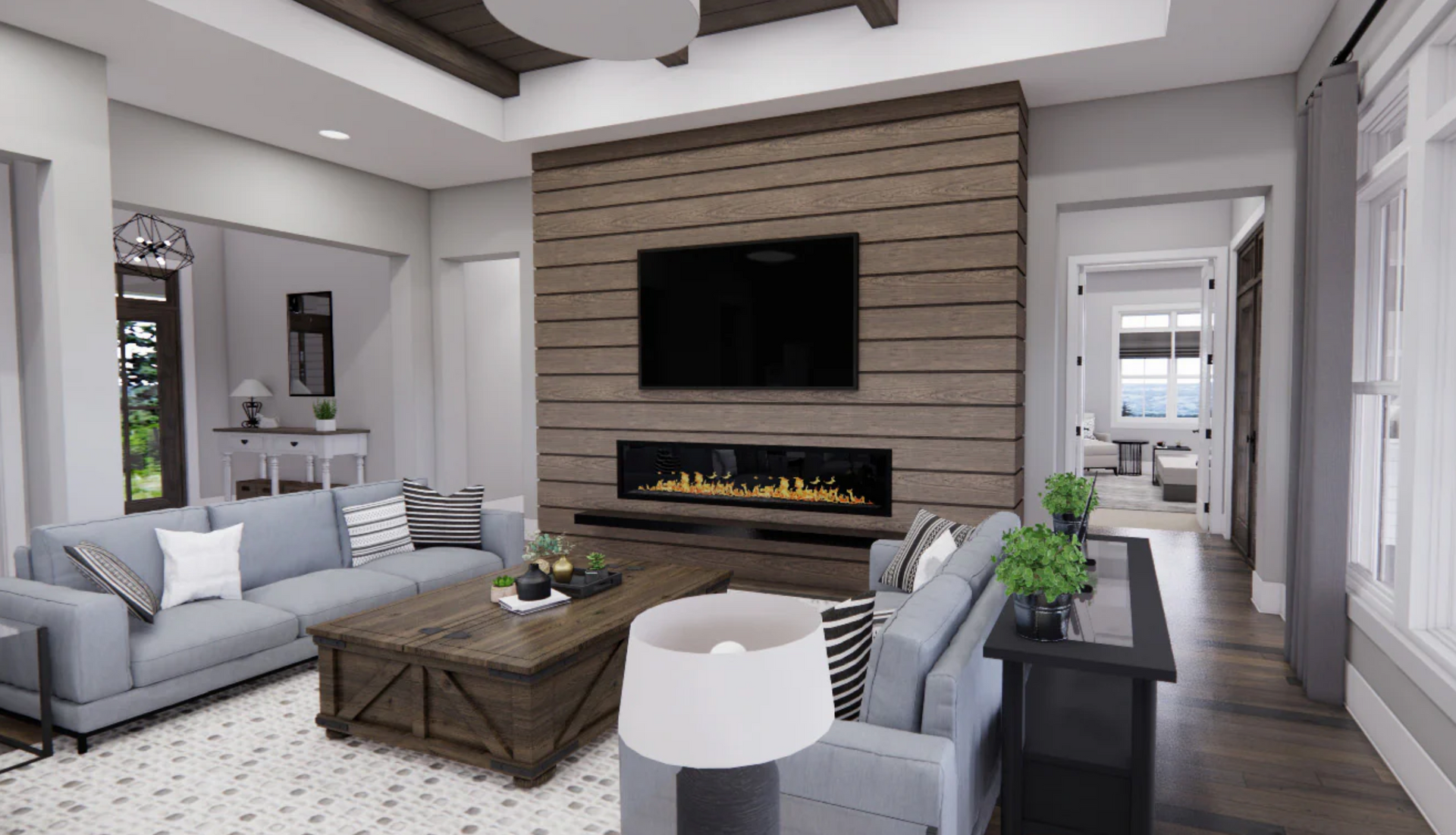 A living room with a fireplace , couch , coffee table and television.