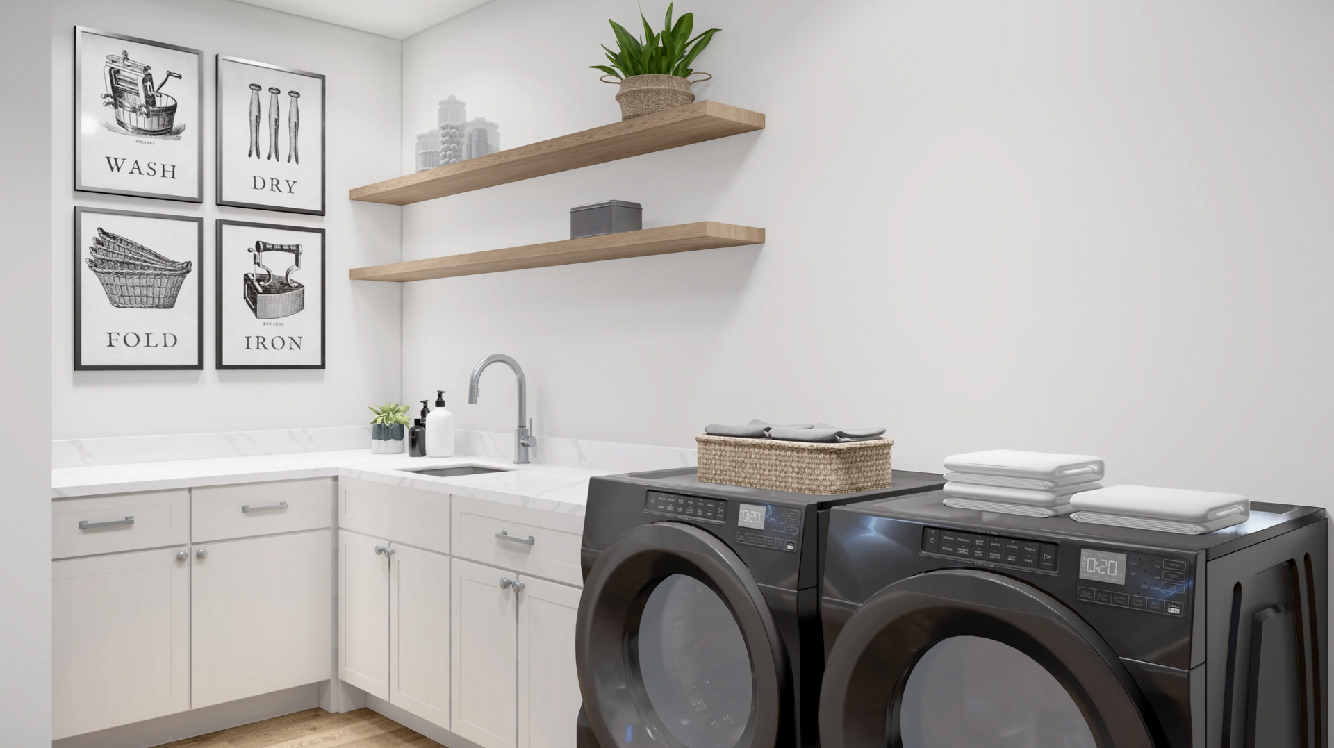 A laundry room with a washer and dryer and a sink.