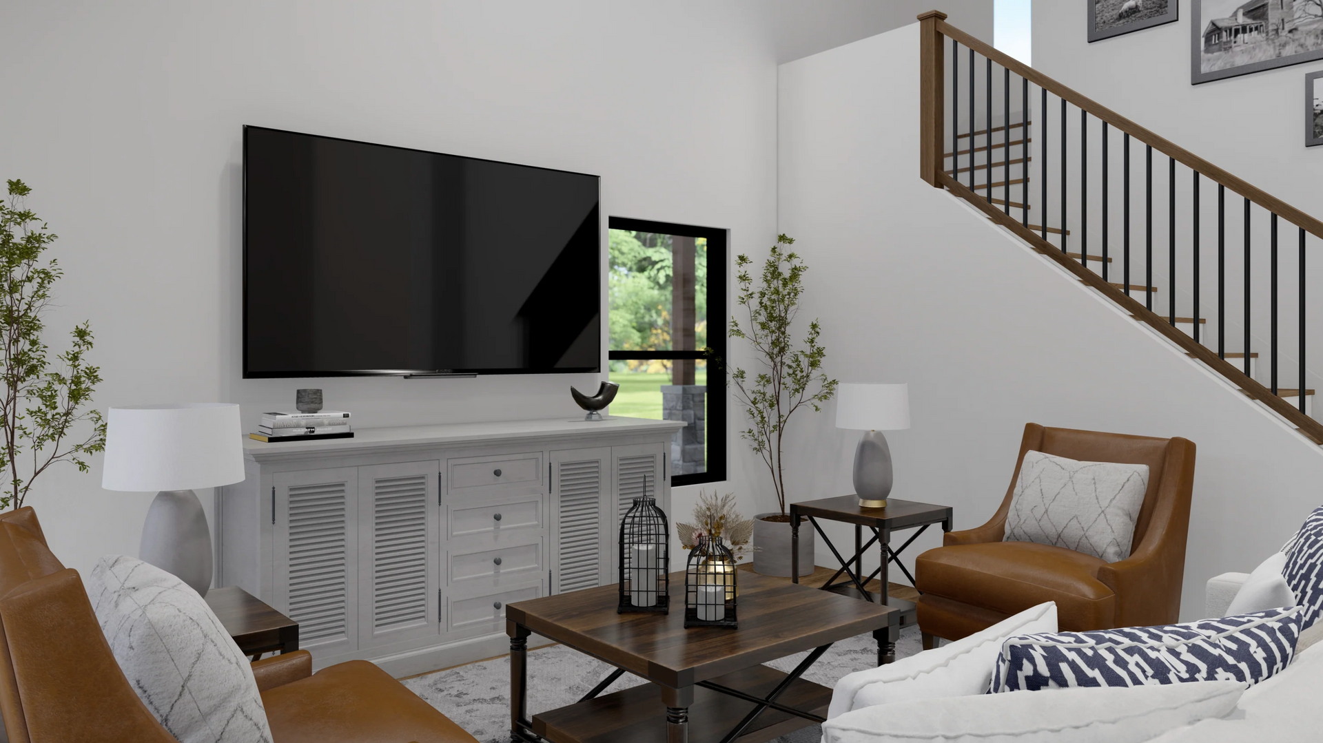 A living room with a staircase and a flat screen tv on the wall.