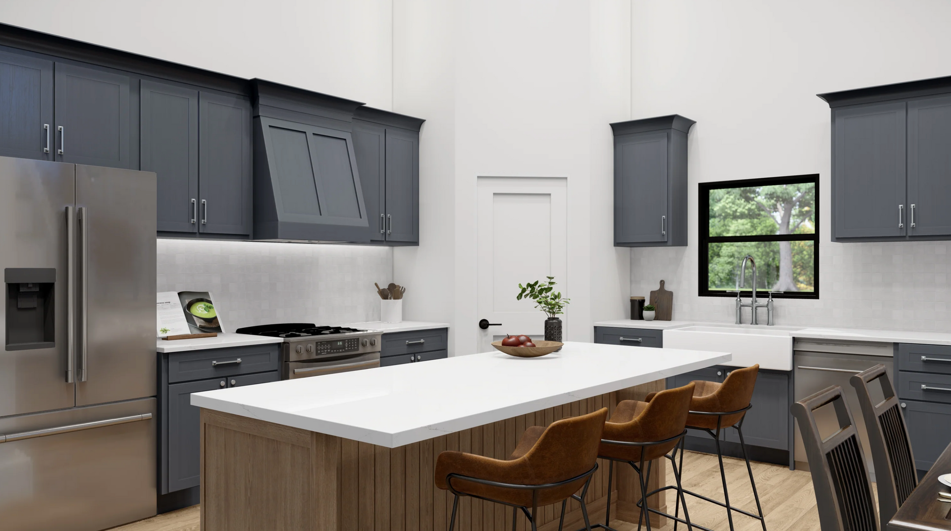 A kitchen with stainless steel appliances , gray cabinets , and a large island.