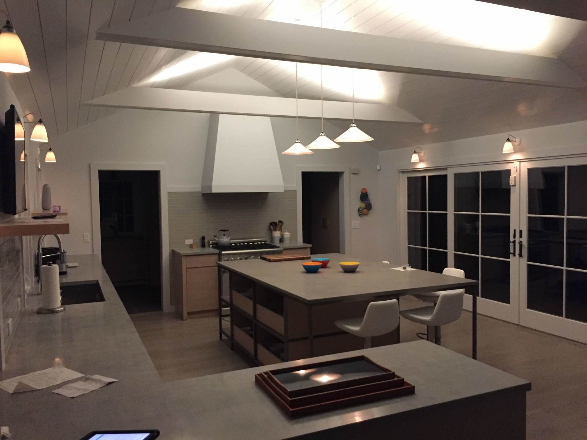 A kitchen with a large island in the middle of it