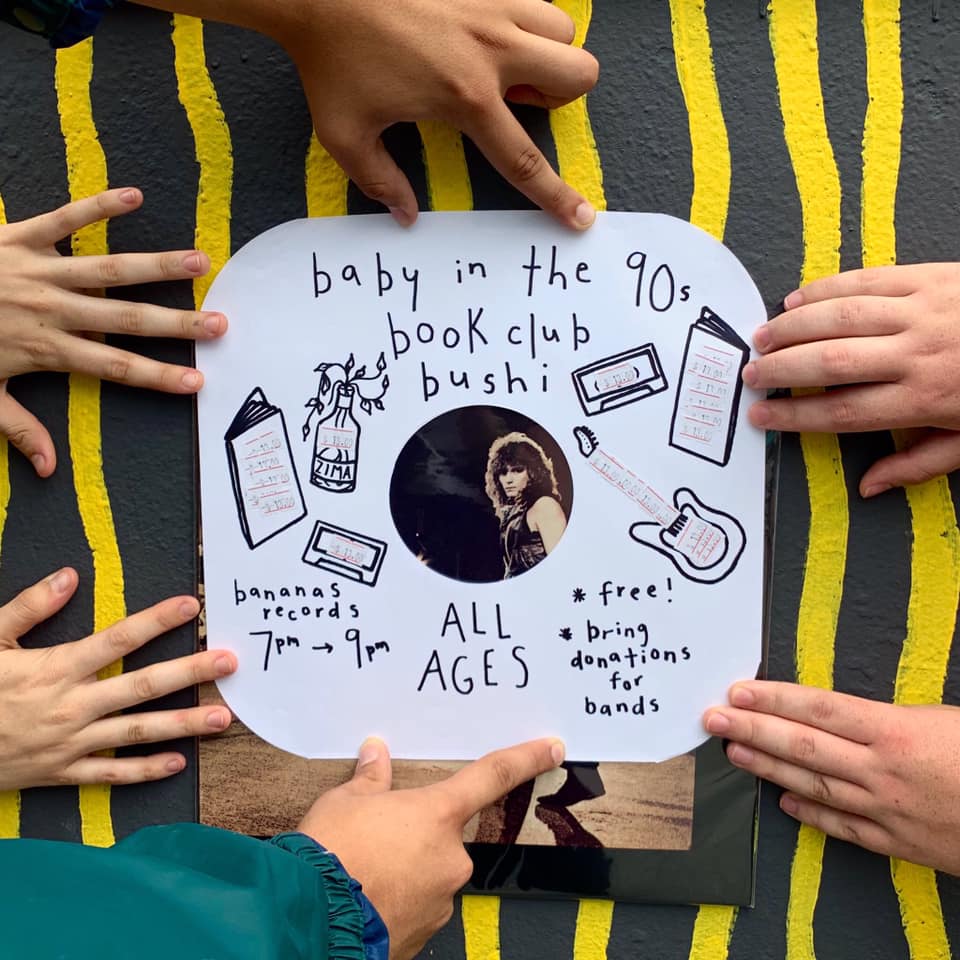Hands pointing to banana records album cover