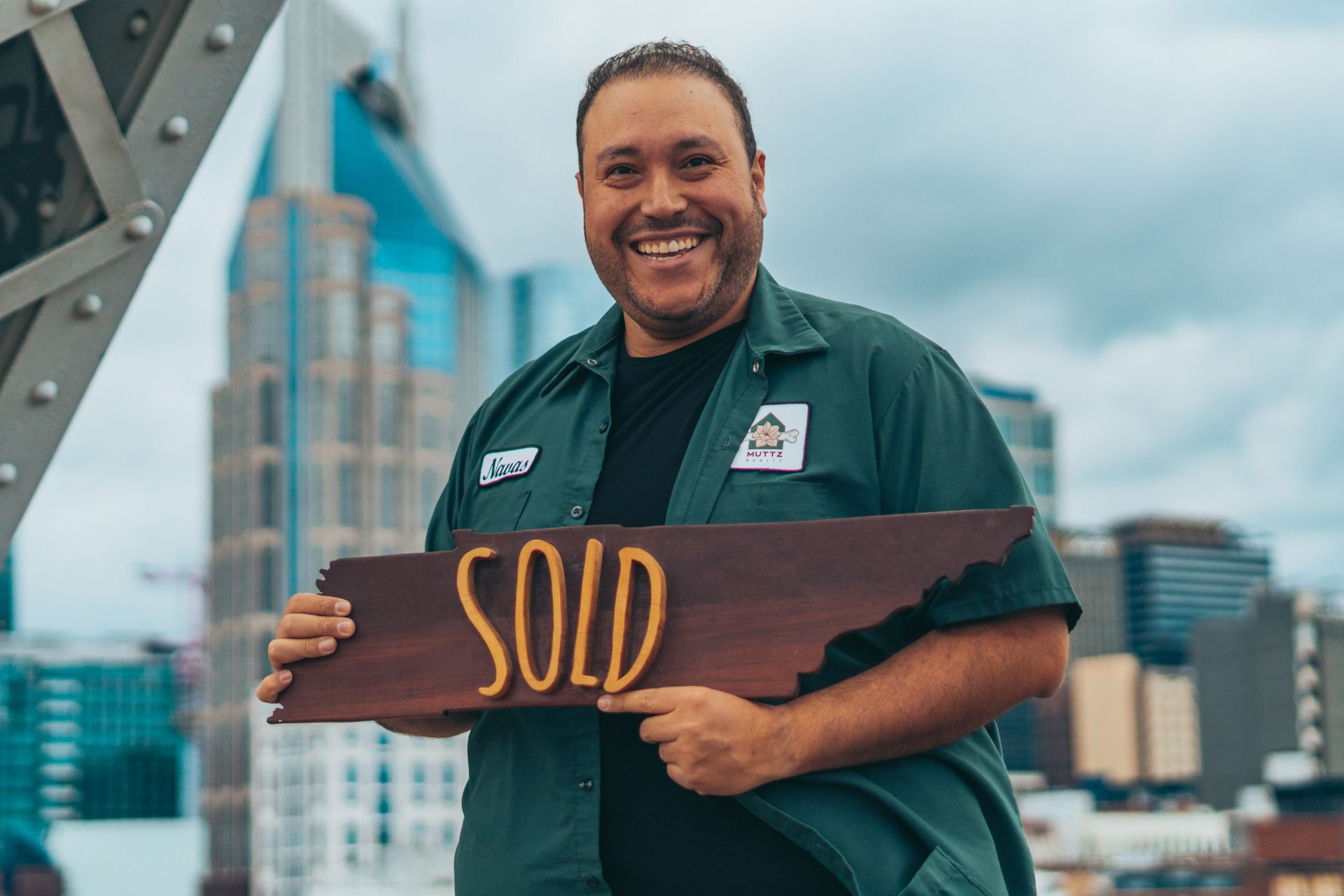 Muttz Realty real estate agent smiling at camera