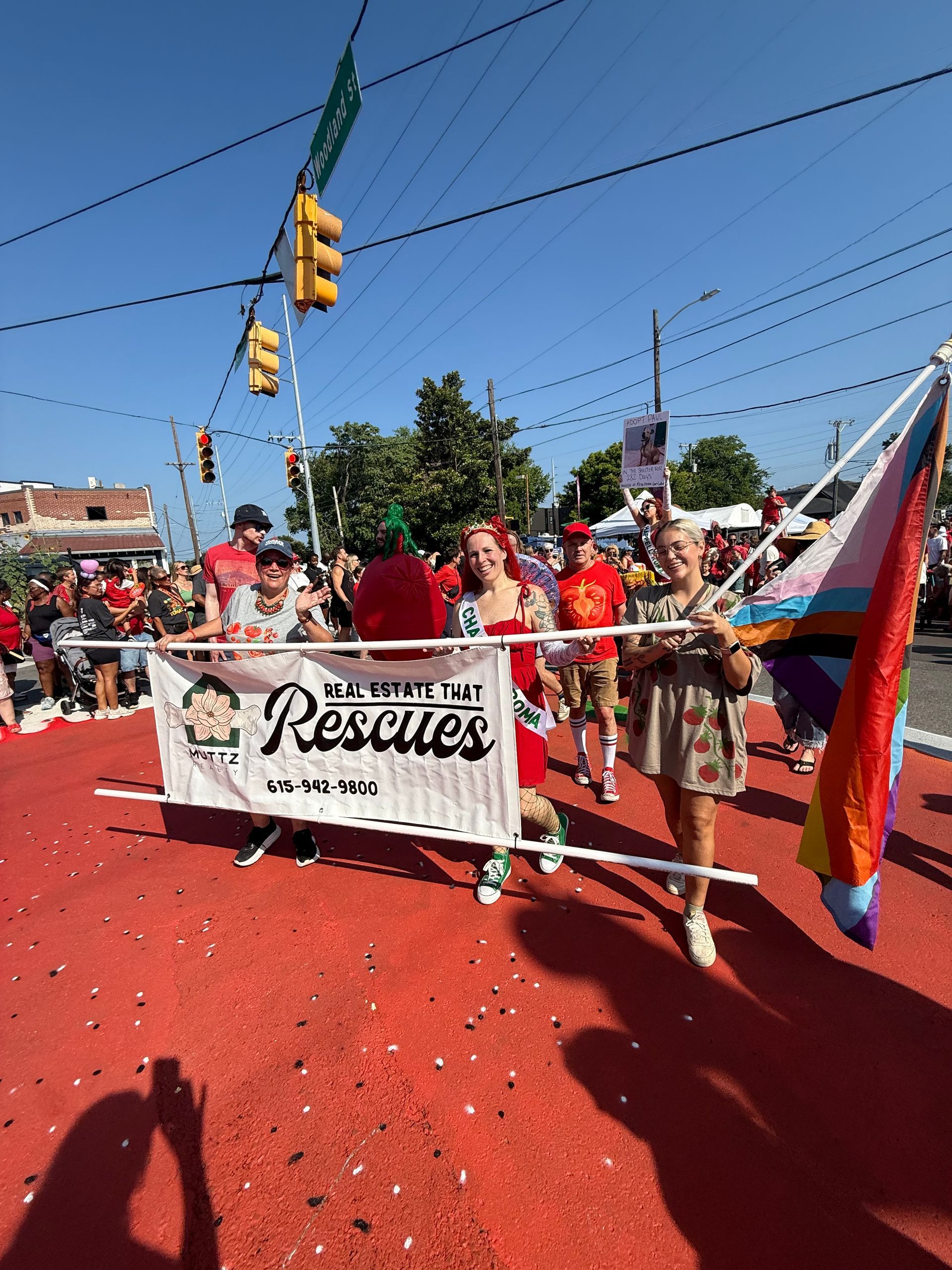 Muttz Realty team in Tomato Art Fest parade