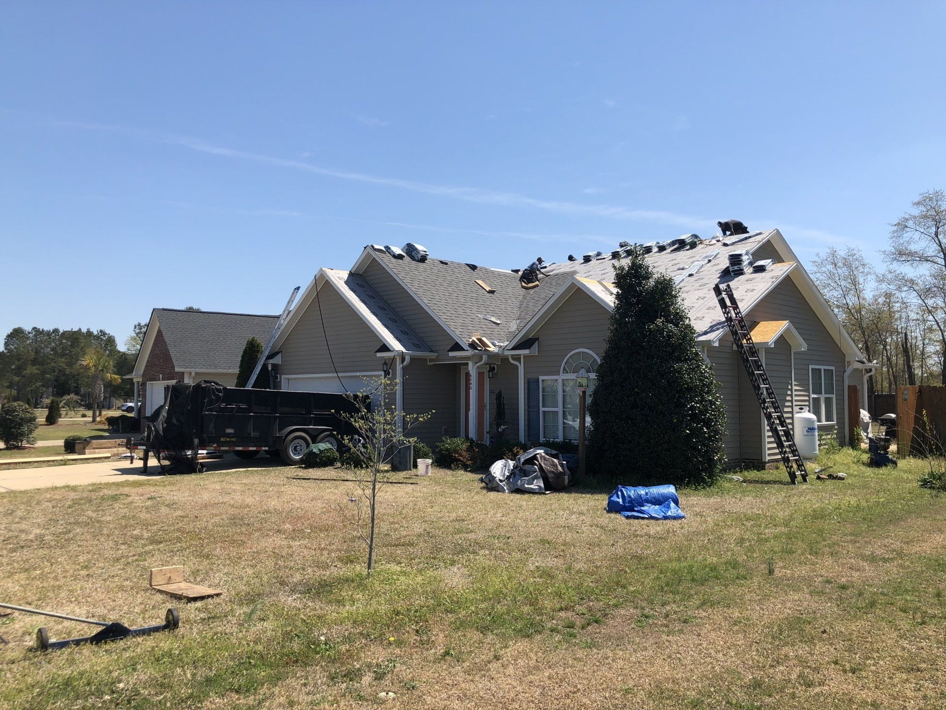 a large house with a truck parked in front of it .