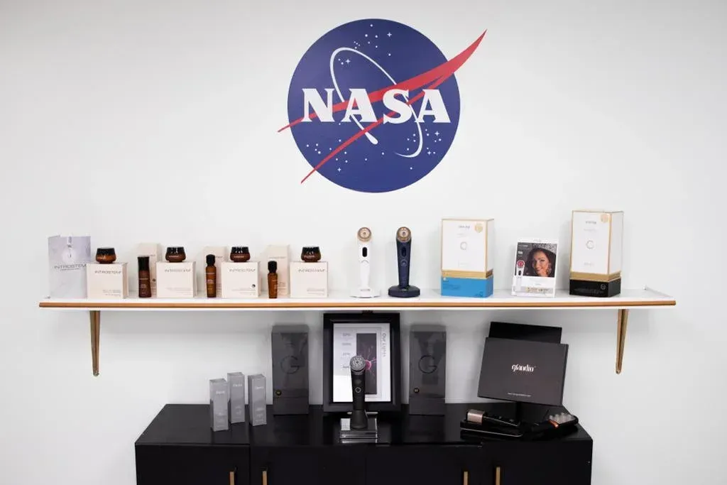 A shelf with skincare products under the NASA logo.