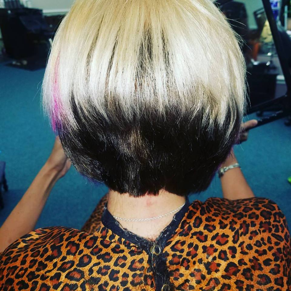 Kayla after photo, rear view - stacked bob with rainbow lowlights