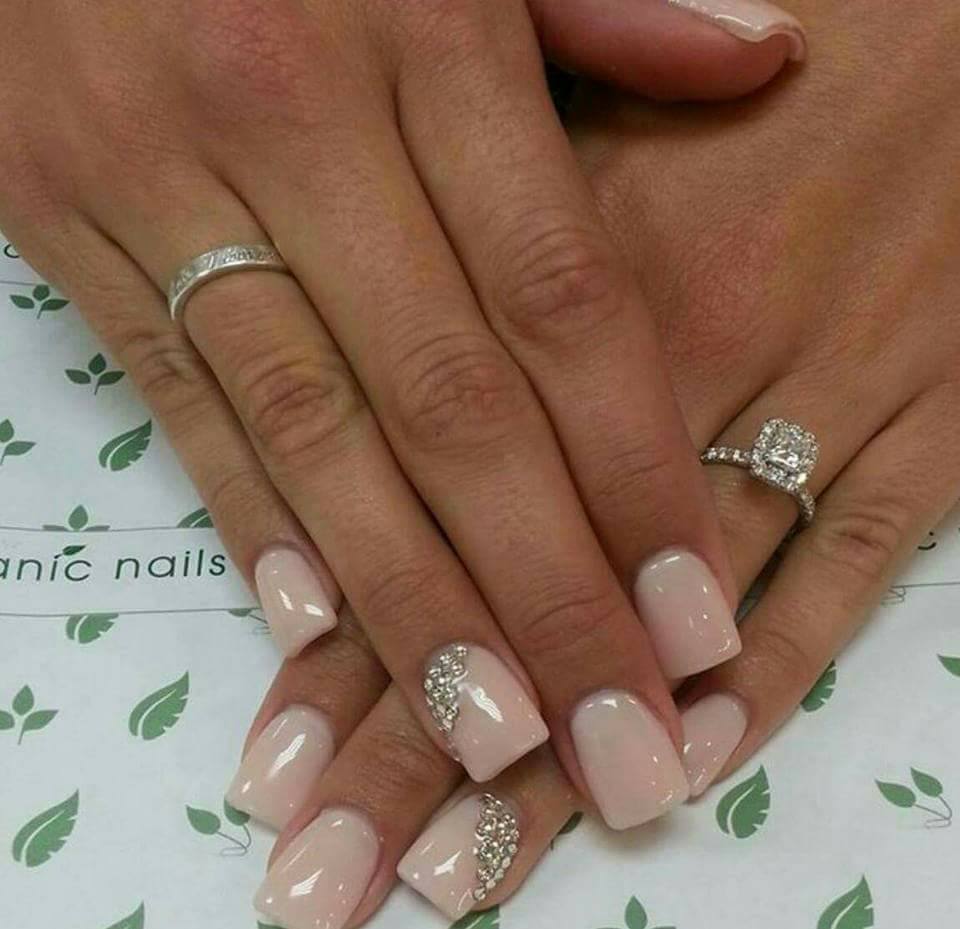 square-tip light pink acrylics with crystal embellishment on accent nail