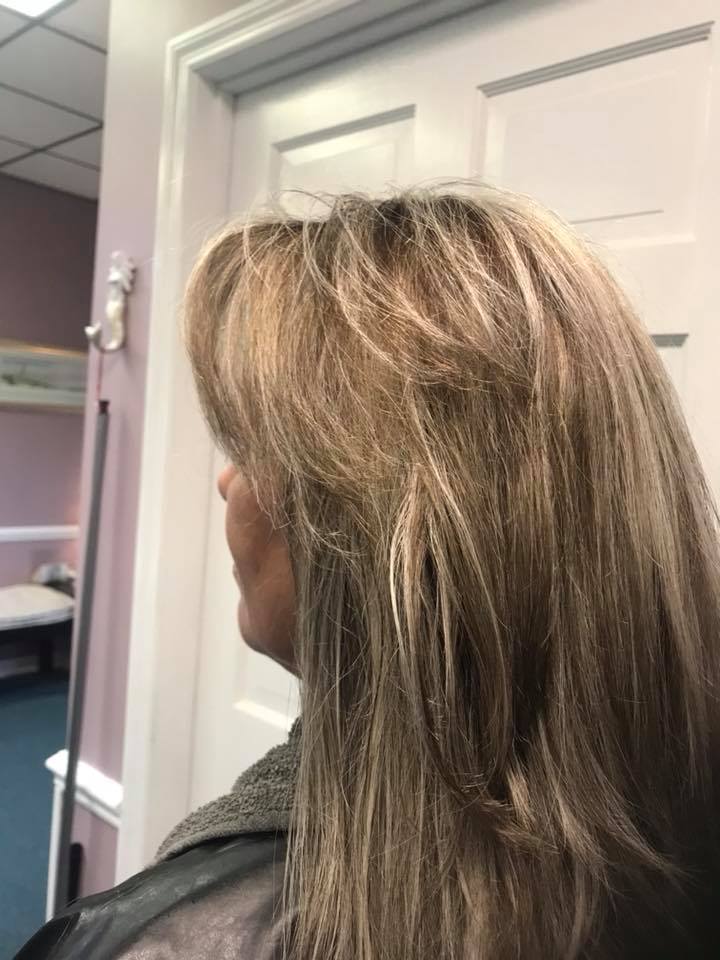Michelle cut and color side view - added layers and lowlights to tone down blonde