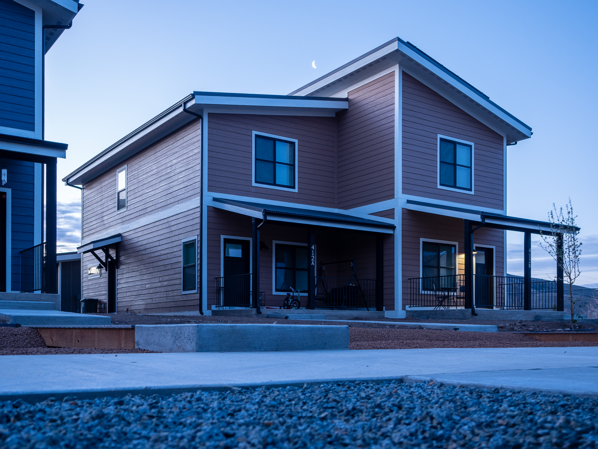 house with blue sky and red