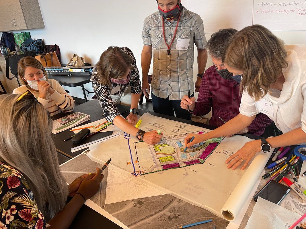 people sitting around a desk