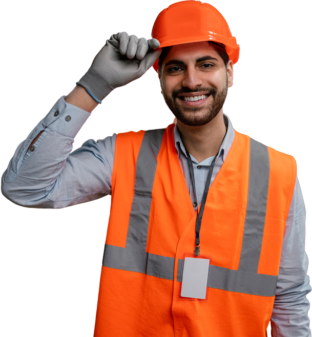 A man wearing an orange vest and hard hat is smiling