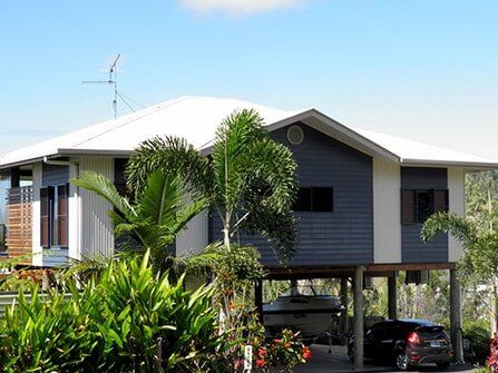 House, blue sky background — Builders in Cannonvale, QLD