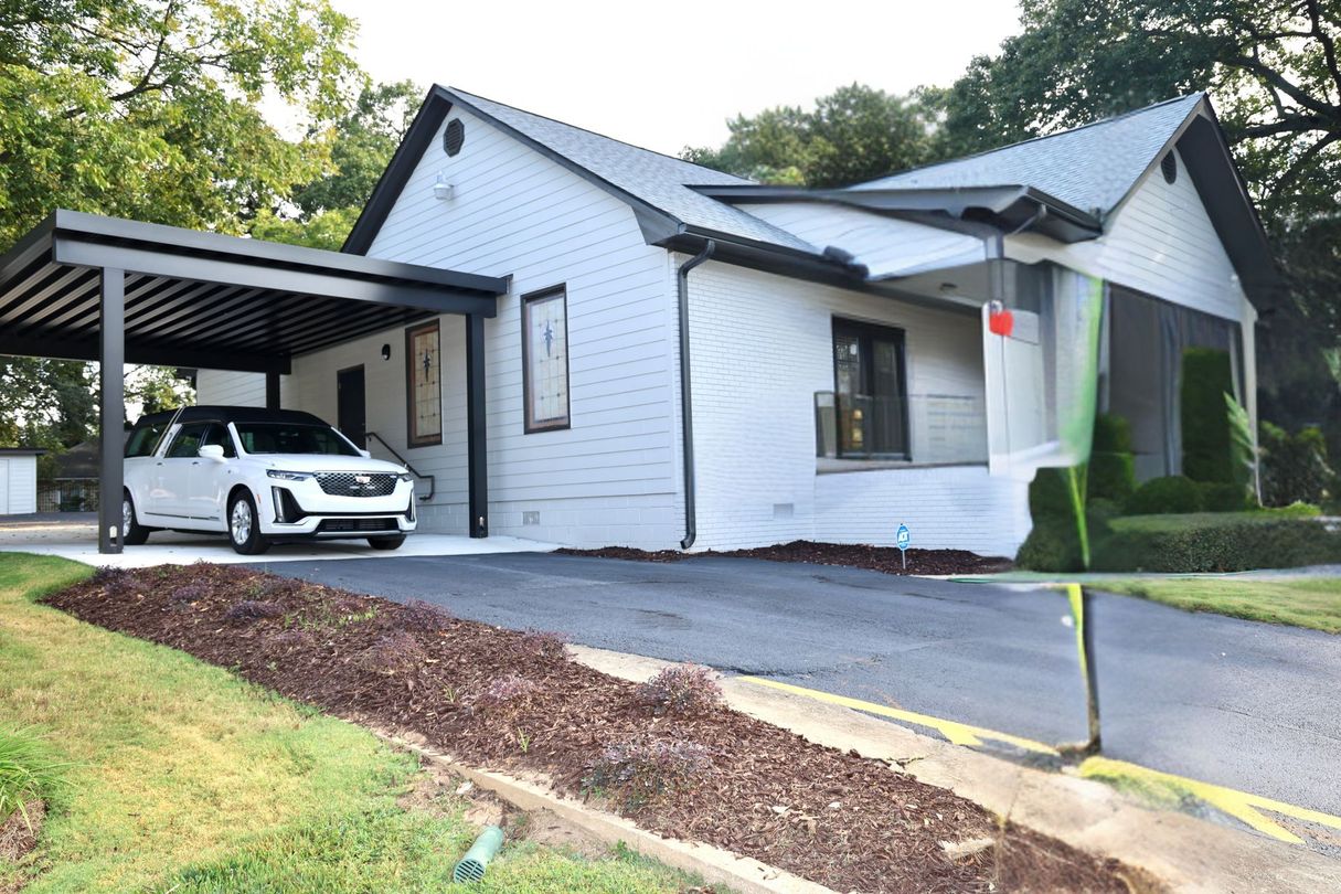 A group of people are posing for a picture together and smiling.
