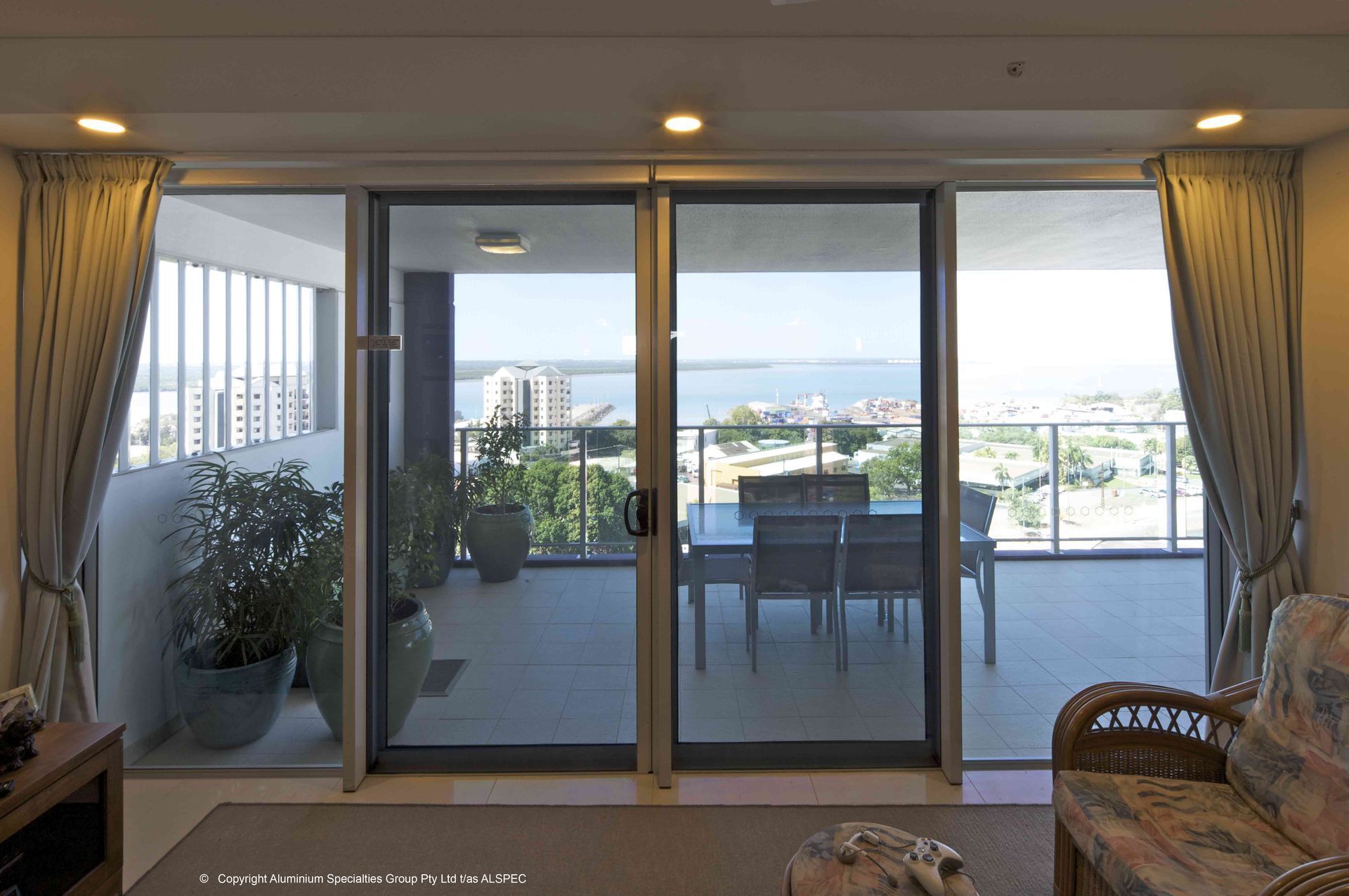 A Window With Roller Blinds And Stairs In The Background — Budget Home Improvements In Murwillumbah, NSW