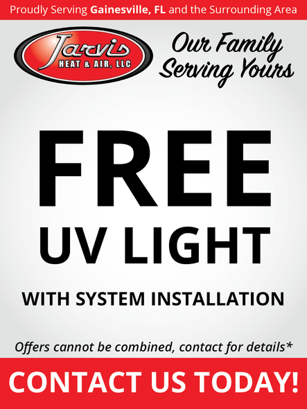 Advertisement for Jarvis Heat & Air offering a free UV light with system installation.