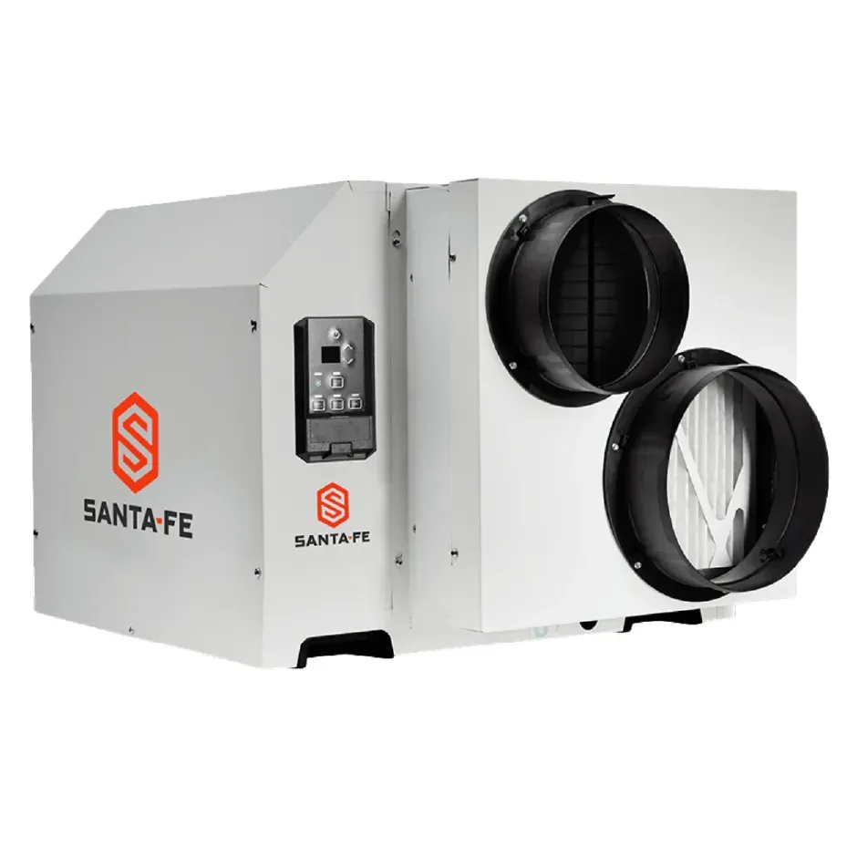 HVAC technician in blue uniform, installing filter in ventilation ductwork.