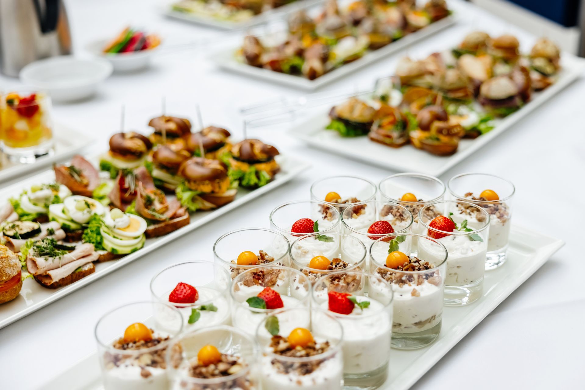A spread of food and drink ready for the attendees at a business conference