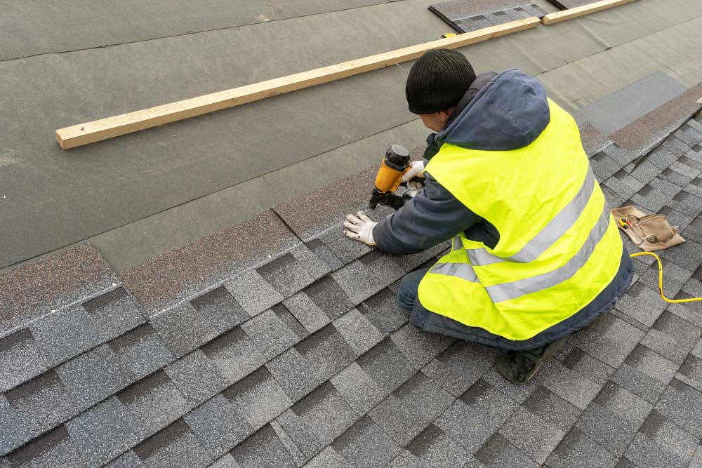 Installing Asphalt Roof — Evansville, IN — Abiz Construction