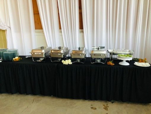 Table full of food at a catering event