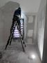 plastering and sanding to paint a room