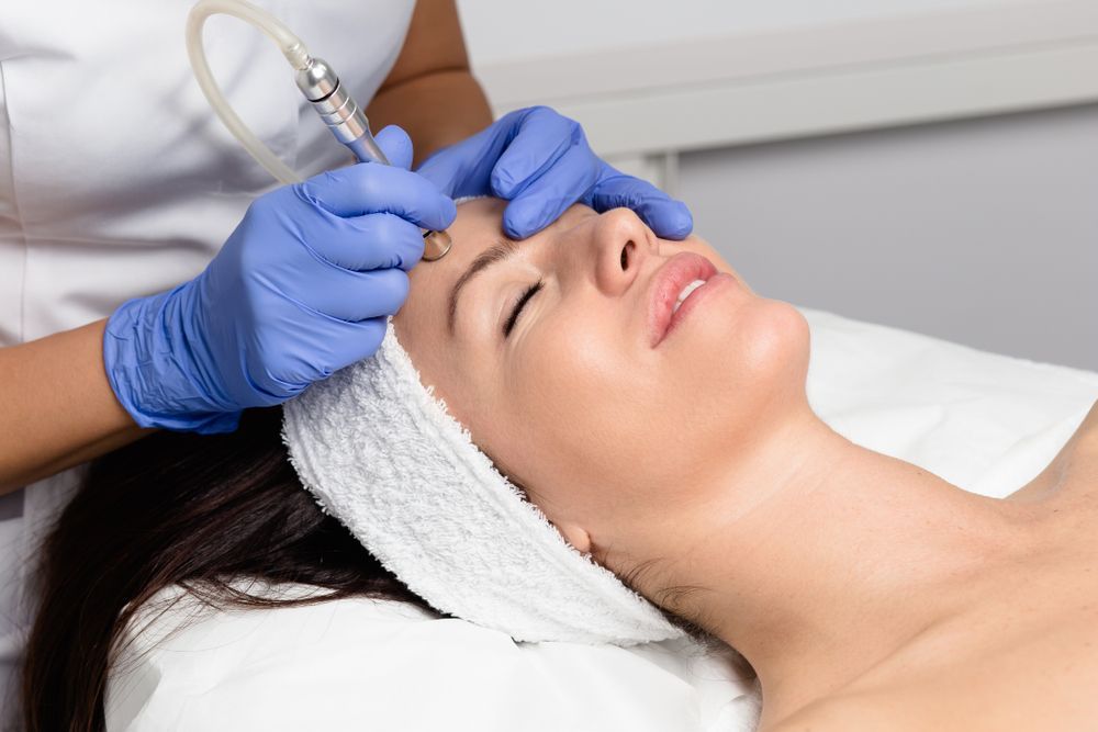 Woman Receiving a Microdermabrasion Facial — Embrace Cosmetic Clinic in Bundaberg North, QLD