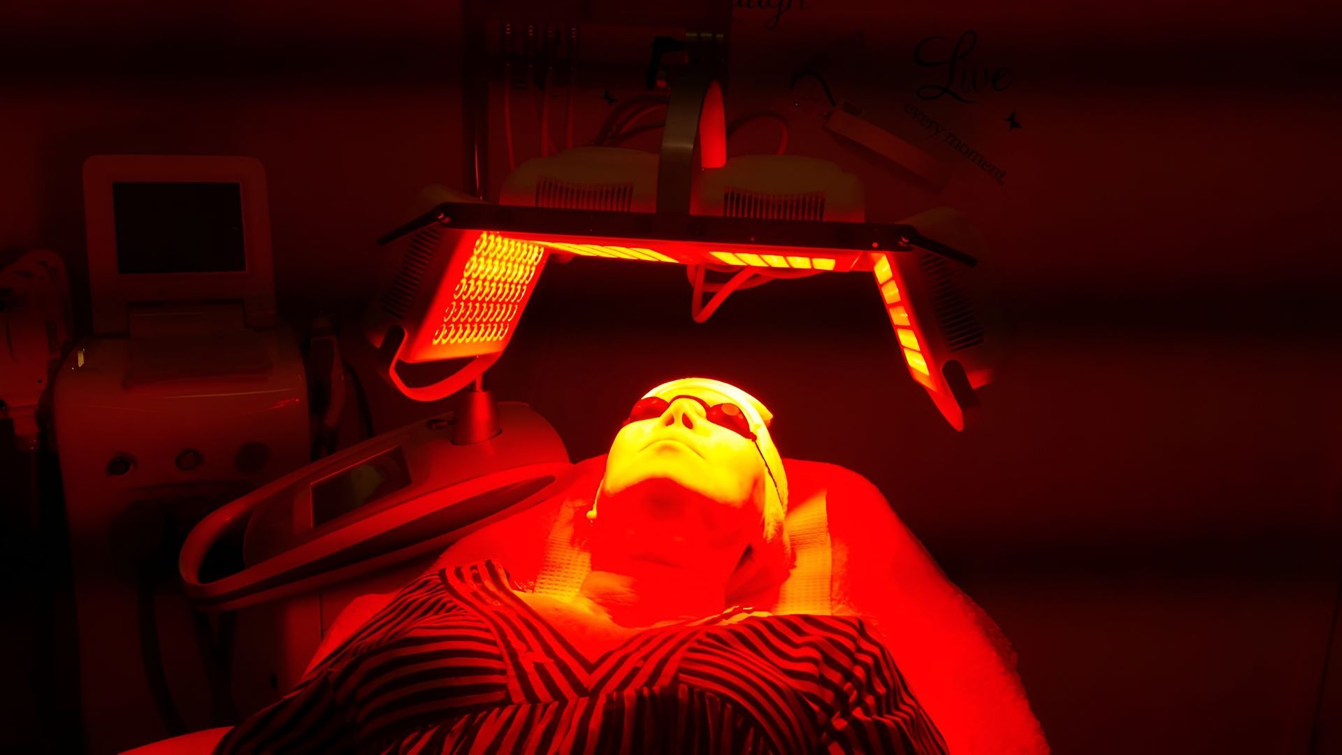 Person Receiving Red Light Therapy Treatment — Embrace Cosmetic Clinic in Bundaberg North, QLD
