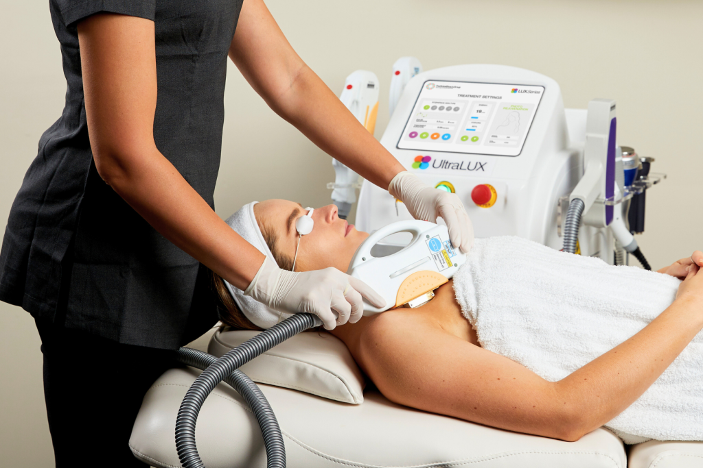 Woman in Laser Treatment— Embrace Cosmetic Clinic in Bundaberg North, QLD